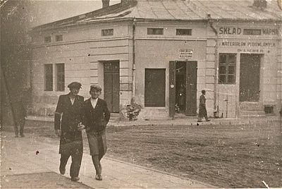 two-friends-walk-along-street-kolbuszowa-ghetto.jpg