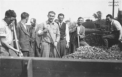 jewish-forced-laborers-shovel-coal-work-site-rzeszow.jpg