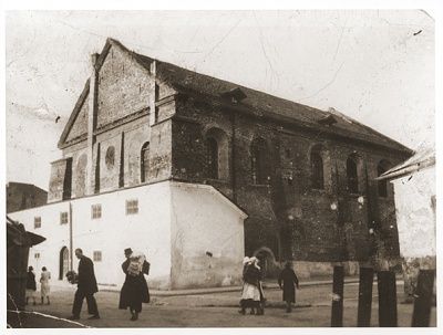 jews-walk-along-street-front-synagogue-rzeszow-poland.jpg