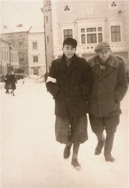 Kolbuszowa and Rzeszów Jewish Life and Ghetto Photos, 1929-1941 - Naftali Saleschütz (left) walks with a friend along a snow covered street in the Rzeszow ghetto