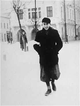 Kolbuszowa and Rzeszów Jewish Life and Ghetto Photos, 1929-1941 - Naftali Saleschütz walks along a snow covered street in the Rzeszow ghetto