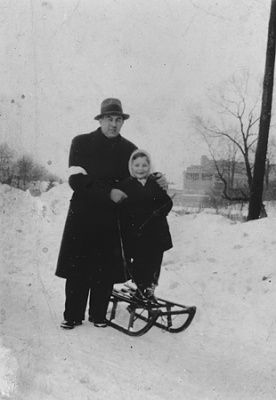 salo-haar-takes-his-son-roman-sledding-rzeszow-ghetto.jpg