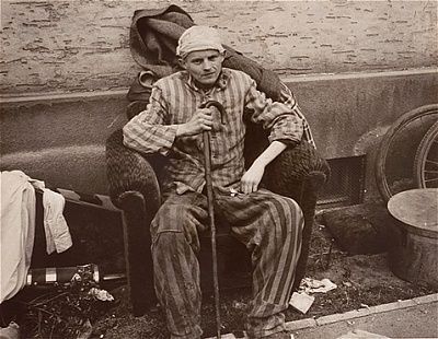 survivor-nordhausen-relaxes-easy-chair-confiscated-american-troops-camp-perso.jpg