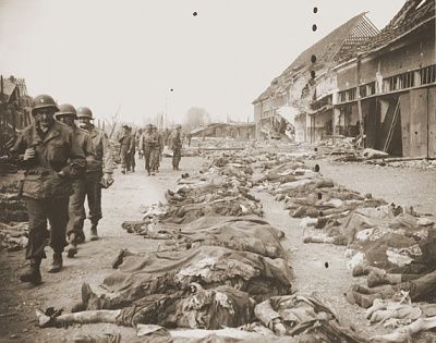 american-soldiers-file-past-bodies-prisoners-killed-nordhausen-concentration-camp.jpg