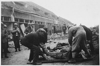 american-soldiers-oversee-german-civilians-forced-clear-away-corpses-nordhausen-concen.jpg
