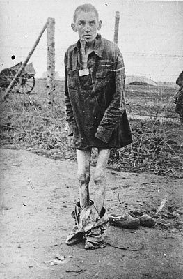 close-up-portrait-emaciated-survivor-wearing-only-shirt-his-uniform.jpg