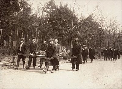 german-civilians-carry-bodies-prisoners-nordhausen-concentration-camp-mass-.jpg