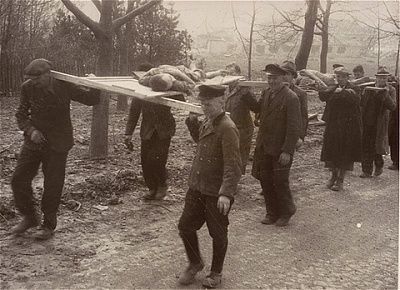 german-civilians-carry-corpses-prisoners-nordhausen-concentration-camp-mass.jpg