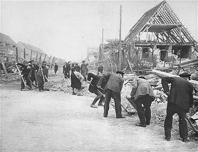 german-civilians-clear-rubble-nordhausen-concentration-camp.jpg