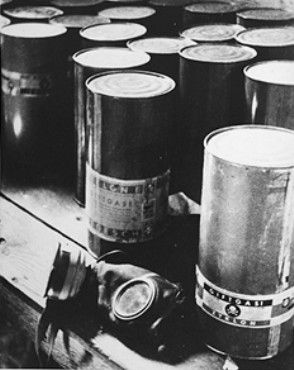Containers of Zyklon B (poison gas pellets) and a gas mask found at Majdanek after the liberatio.jpg