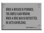 biblical-proverb-21-11-engraved-on-a-grey-tablet.jpg