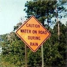 water on rd during rain.JPG