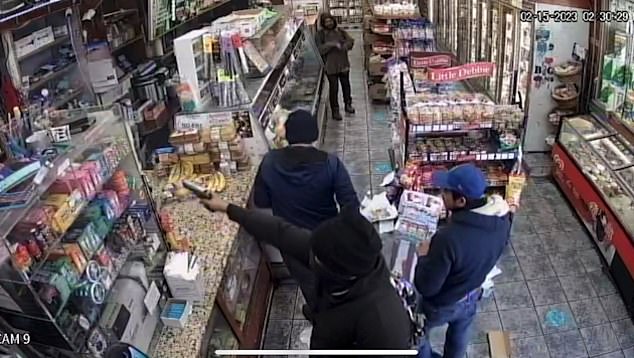67807491-11763629-Footage_shows_the_assailant_in_the_store_two_hours_earlier_appea-a-35_16766849.jpg